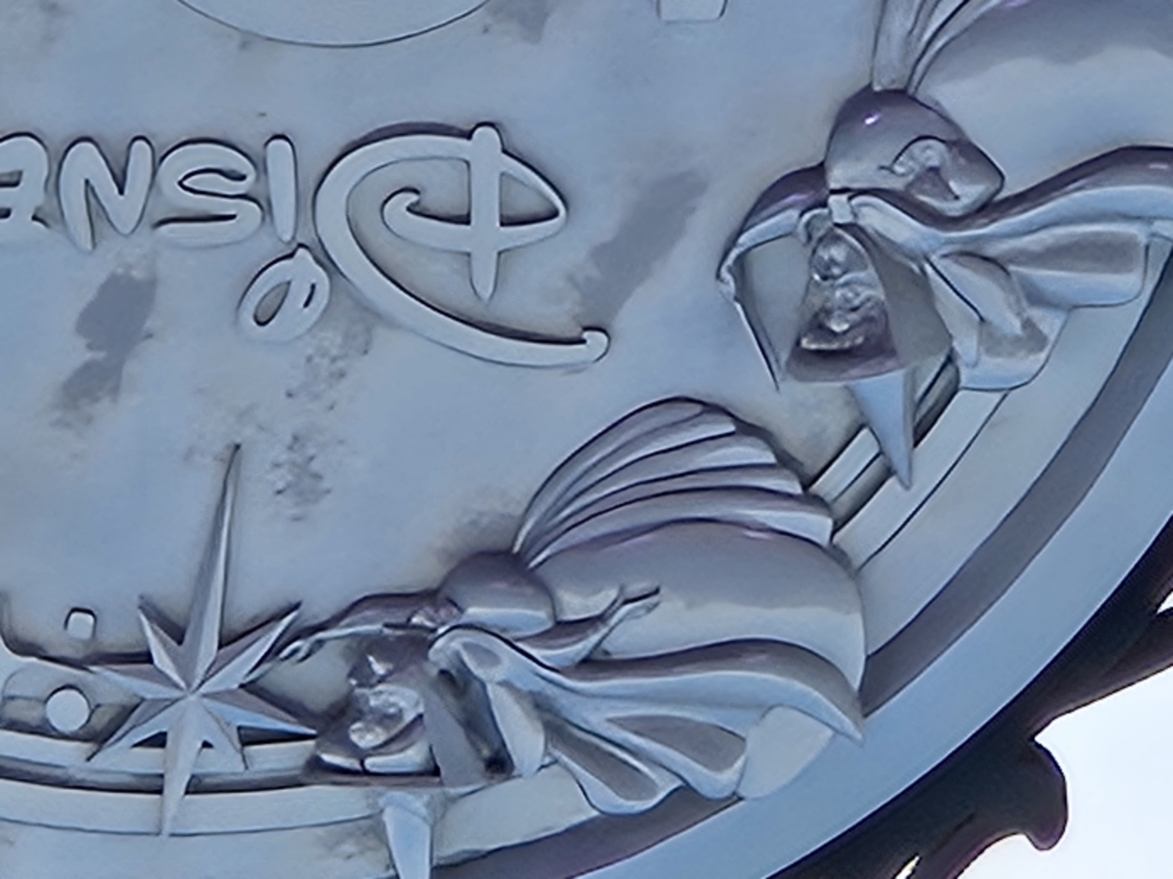 Disney 100 Years of Wonder sign above Disney California Adventure Park at 30X